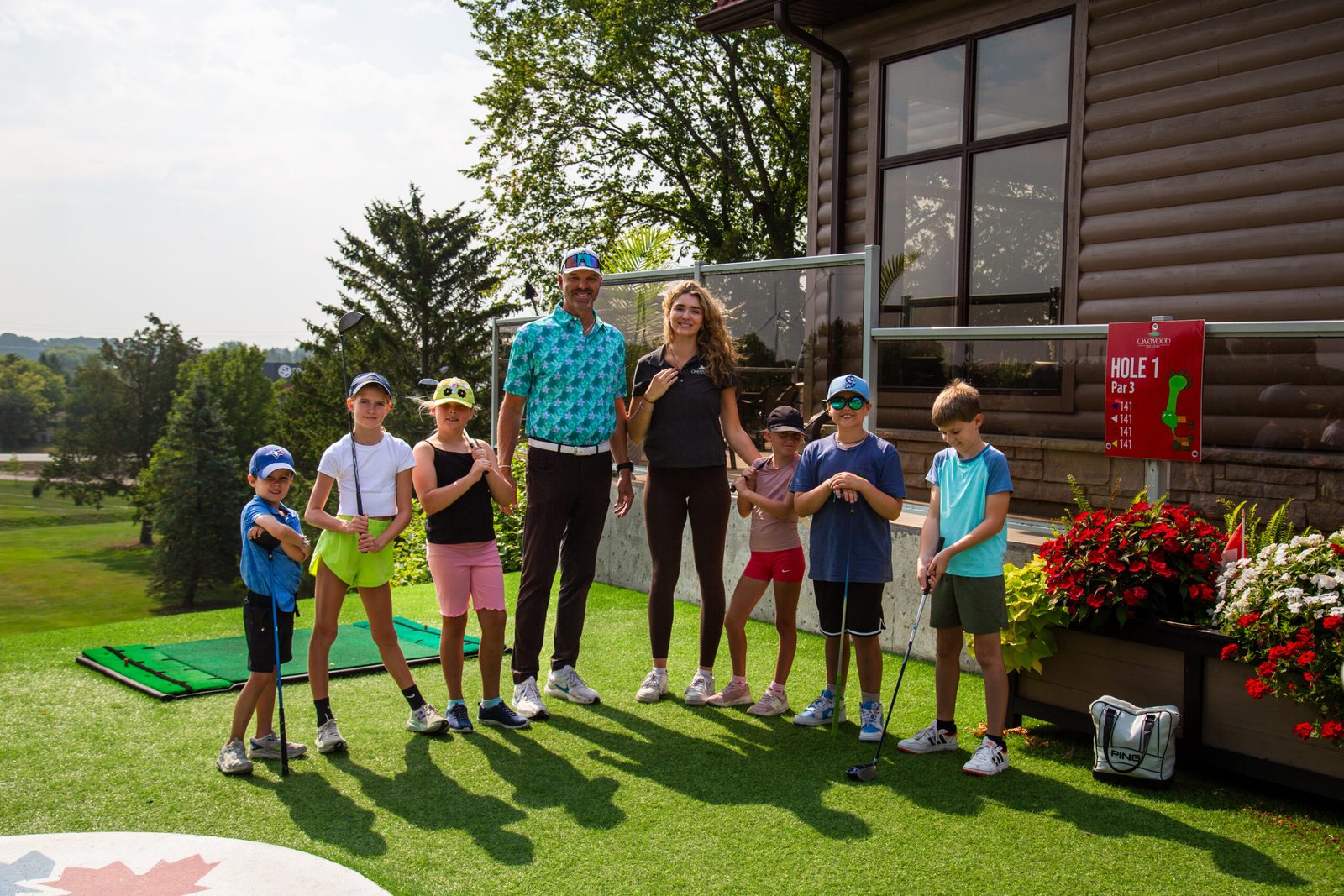 The Kids Golf Camp group at hole 1