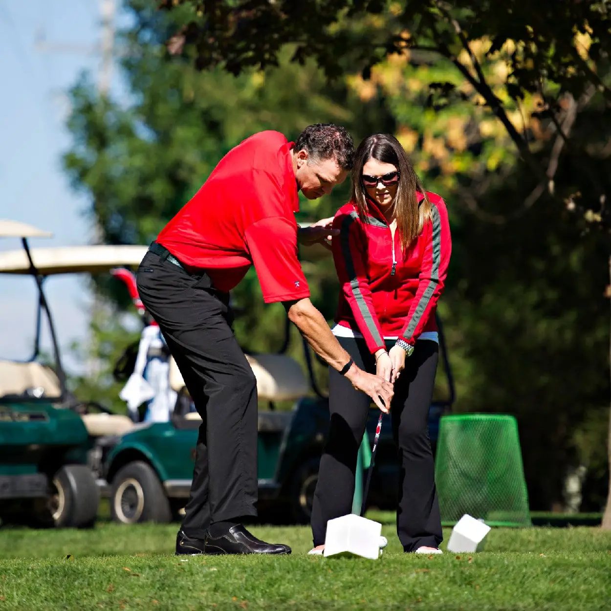 Colin Scatcherd coaching a student's setup